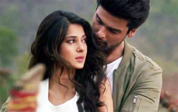 Kushal tandon alongside Jennifer Winget